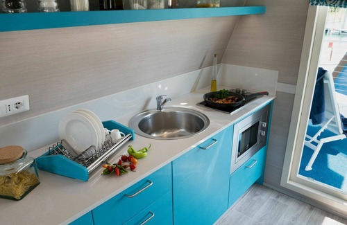 Lignano Sabbiadoro House | Nice apartment in villa for 6 guests with pool, A/C, WIFI, TV, terrace and pets allowed
