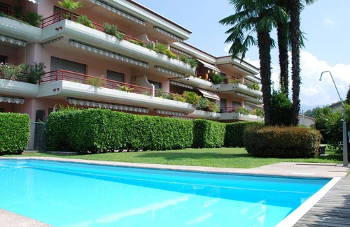 Caslano Apartment | Nice apartment for 4 people with pool, WIFI, TV, patio and pets allowed