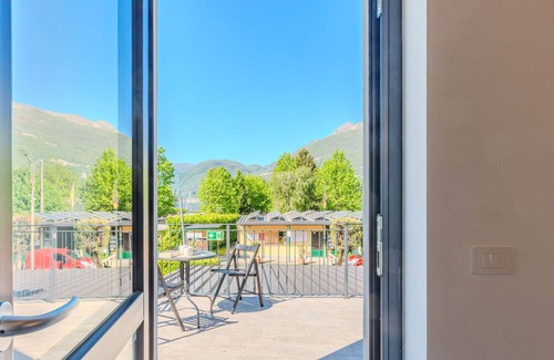 Dervio Apartment | Nice apartment for 4 guests with A/C, pool, WIFI, TV, patio and panoramic view