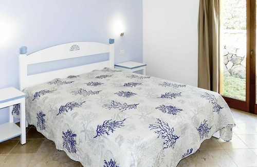 Porto Pozzo Apartment | Nice apartment for 6 people with WIFI, pool, A/C, terrace, pets allowed and parking