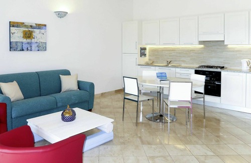 Porto Pozzo Apartment | Nice apartment for 6 people with WIFI, pool, A/C, terrace, pets allowed and parking
