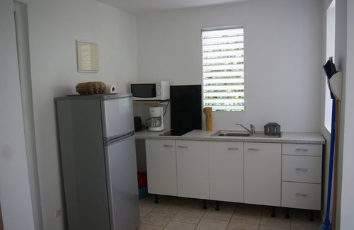 Sainte-Anne Cottage | Nice little comfortable apartment in 5 minutes the most beautiful beaches of St. Anne