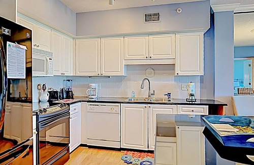 Litchfield by the Sea Condo | Nice! Paget 403 Features Oceanside Views of Pool, Clubhouse