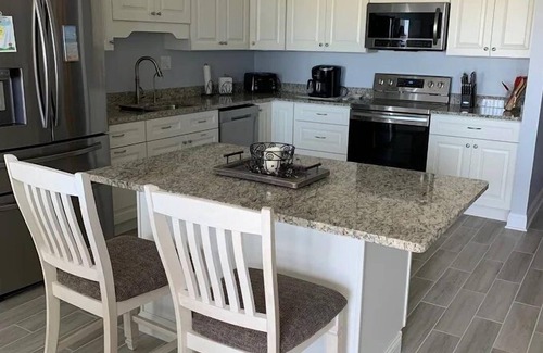 Avalon Condo | Nicely appointed two bedroom air conditioned Merrimack Condominium offering beachblock location,