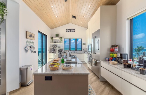 Stuart House | Nirvana Shores: Ocean-2-River FL Beach House w/heated pool,dock,elevator,hot tub