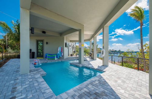 Stuart House | Nirvana Shores: Ocean-2-River FL Beach House w/heated pool,dock,elevator,hot tub