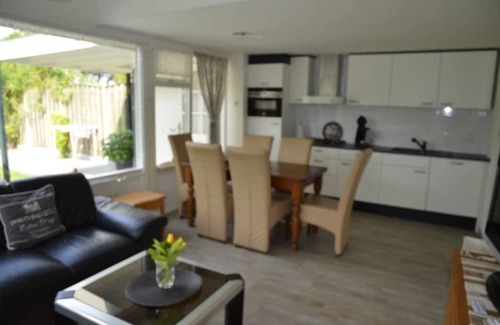 Stavenisse House | Oasis of relaxation - Het Puppenhuisje with communal pool,