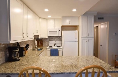 North Ocean City Condo | Ocean Block Condo, porch, 1st floor, steps to beach, updated, full kitchen, lg dining table, wifi!