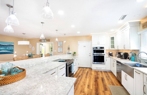Indian Rocks Beach House | Ocean Dreaming: Waterfront Home with Heated Pool, New Dock and Amazing Sunsets!