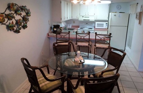 Crescent Beach Condo | OCEAN FRONT! Ground Floor End Unit! Private dock with gorgeous sunsets!
