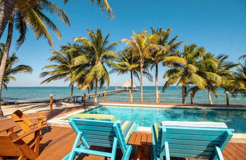Placencia Condo | Ocean view condo at beachfront complex with AC, free WiFi, & pool