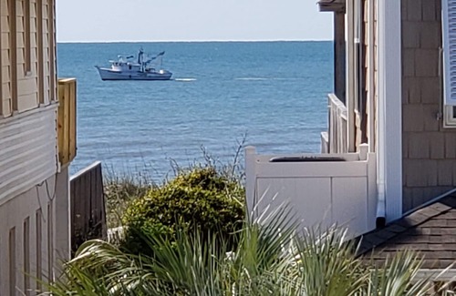 Ocean Isle Beach House | Ocean View Family Home! Games, Hammocks & Chill Space Underneath. Walk to Shops!