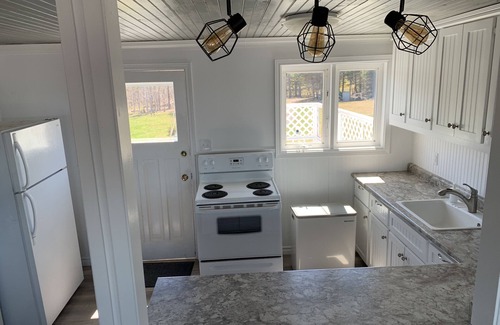 Pictou County Cottage | Oceanfront beach cottage panoramic views spectacular sunsets sandbars warm water