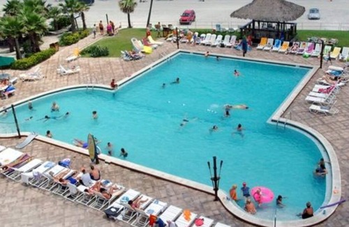 Daytona Beach Shores Apartment | Oceanfront resort, just steps from the sand and surf. Outdoor & indoor pools.