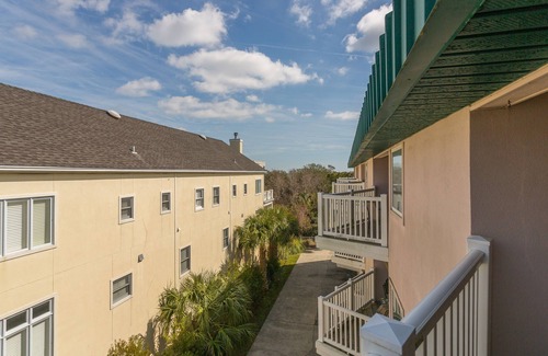 Saint Simons Island Condo | Oceanfront Condominium with Balcony, Pool and Boardwalk to Beach. Partial Ocean View