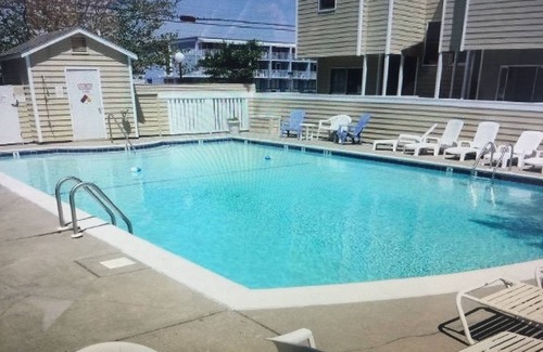 Fenwick Island Condo | Oceanside Fun in Fenwick Island! Charming retreat steps from beach and pool