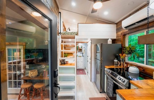 Powell Cabin | Off-Grid Cabin Surrounded by Trees in Pineville, Missouri