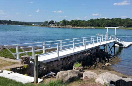 Gloucester Cottage | OFFICIAL SITE - Buoy 23 Vacation Home | Gloucester, MA | Deepwater dock
