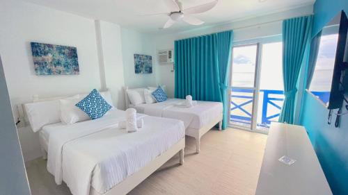 Bauan Hotel | OIA by Seascape