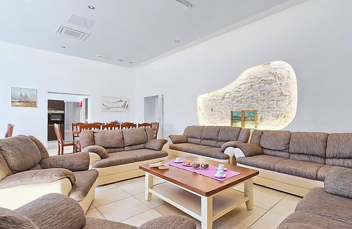 Tinjan House | Old School House by Interhome
