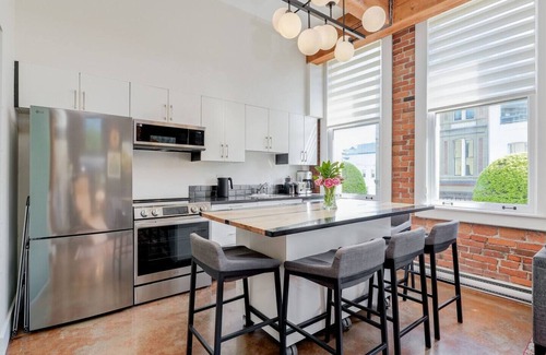 Downtown Victoria Condo | Old Town Retreat-your artful escape in Victoria's historic Old Town by Victoria Prime!