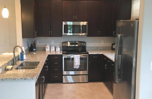 Ole Condo | OLE AT LELY RESORT, 1 BLOCK FROM VILLAGE CTR, QUAD POOL