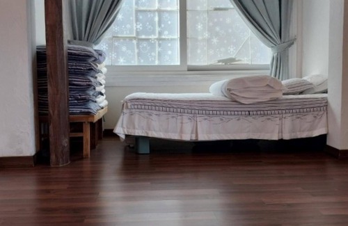 Wanju House | Olive Wanju Pension