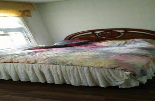 Wanju House | Olive Wanju Pension