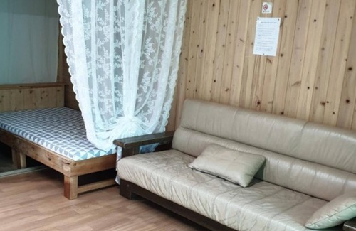 Wanju House | Olive Wanju Pension