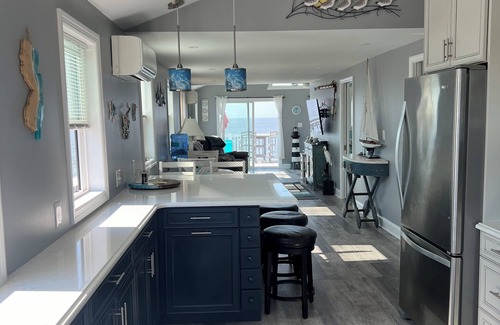 Green Creek House | On The Beach. Cape May county beach cottage with breathtaking sunset views.