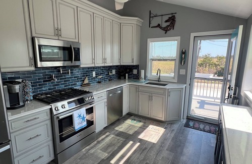 Green Creek House | On The Beach. Cape May county beach cottage with breathtaking sunset views.