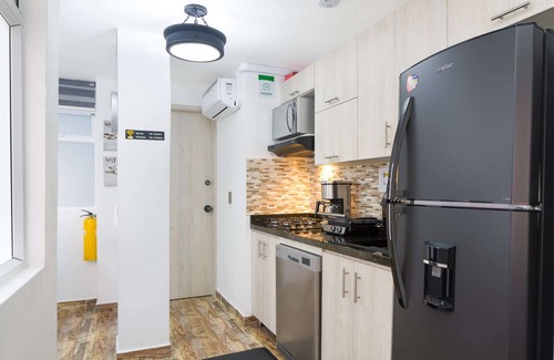 Medellin Apartment | One bedroom Hot tub AC security king bed, Dishwasher