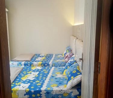 Al-Basatin Apartment | ONE KATaMEYA شقة لك بالكامل غرفة باثنان سرير وريسبشن و مطبخ مجهز و حمام تراس