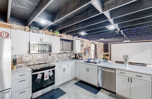 Avoca House | One-of-a-kind retreat with home theater, indoor basketball, private pool, & gym