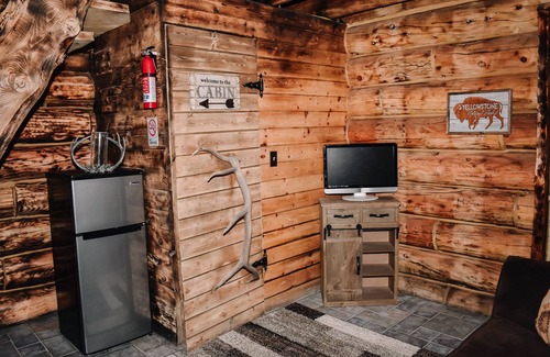 West Yellowstone Cabin | One of a kind, rustic cabin with rodeo and private pond on site~7 miles to YNP!