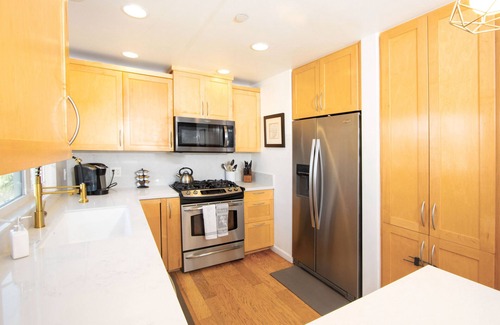 Townsite Condo | Oside Beach condo. Steps from beach. All the toys you could need!