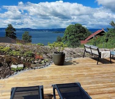 Nesoddtangen House | Oslo Fjord views with your own private beach hut at Flaskebekk