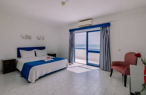 Oura Hotel | Oura Beach Getaway! Two Spacious 2BR with Full Kitchens, Beachfront, 2 Pools!