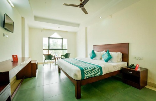 Kalpetta Hotel | OYO 15226 Crystal Residency