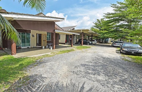 Paka Hotel | OYO 90596 Casaria Inn