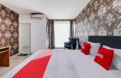 Ngamprah Hotel | OYO 90873 Orchid Guesthouse