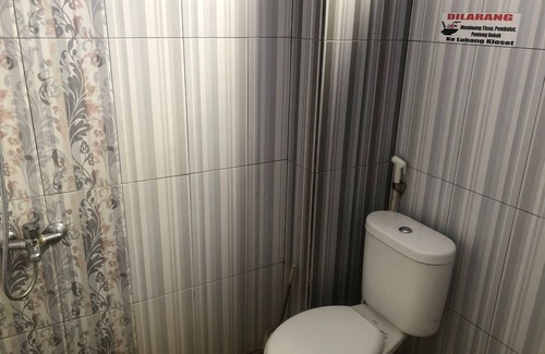 Samarinda Hotel | OYO 94667 Madina Homestay
