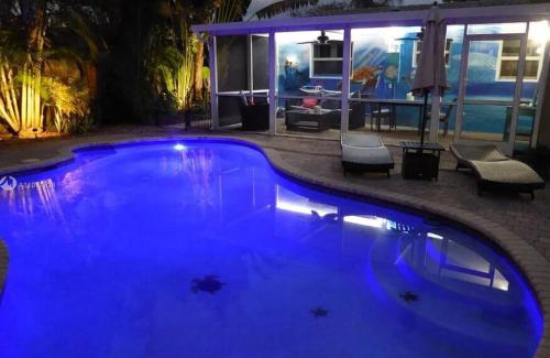 North Corals House | Palm Paradise-Seaside Home w Heated Saltwater Pool
