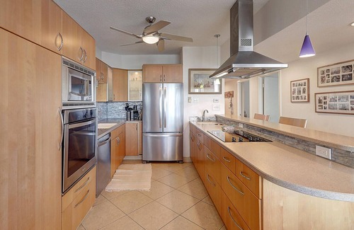 Port Aransas Condo | Panoramic views of the ship channel & private fishing pier from living room!