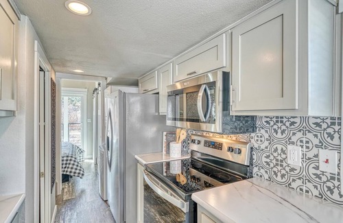 Salida Cabin | Park Model Cabin - Twin Loft - One queen bed in the private bedroom, with two twin beds in the open loft.