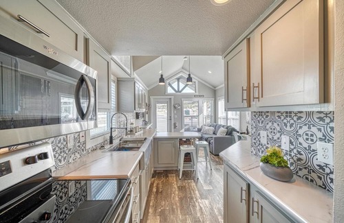 Salida Cabin | Park Model Cabin - Twin Loft - One queen bed in the private bedroom, with two twin beds in the open loft.