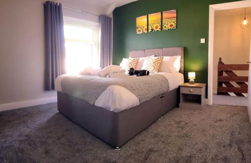 Port Talbot Apartment | Parking, 4 Bedrooms, Small Courtyard