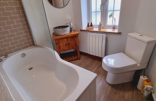 Bridford House | Pass the Keys | Charming 19th century country cottage for 2 guests