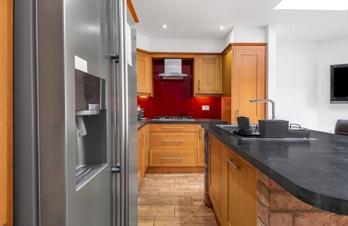 Kenton East House | Pass the Keys | Spacious 4-Bedroom Family Home with Garden