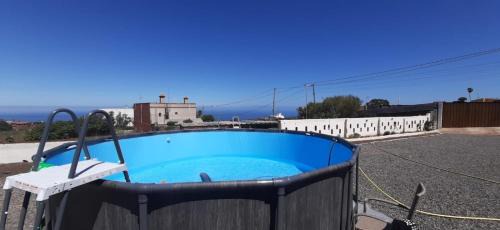 Llano del Moro House | Peaceful Getaway with Pool & BBQ Area